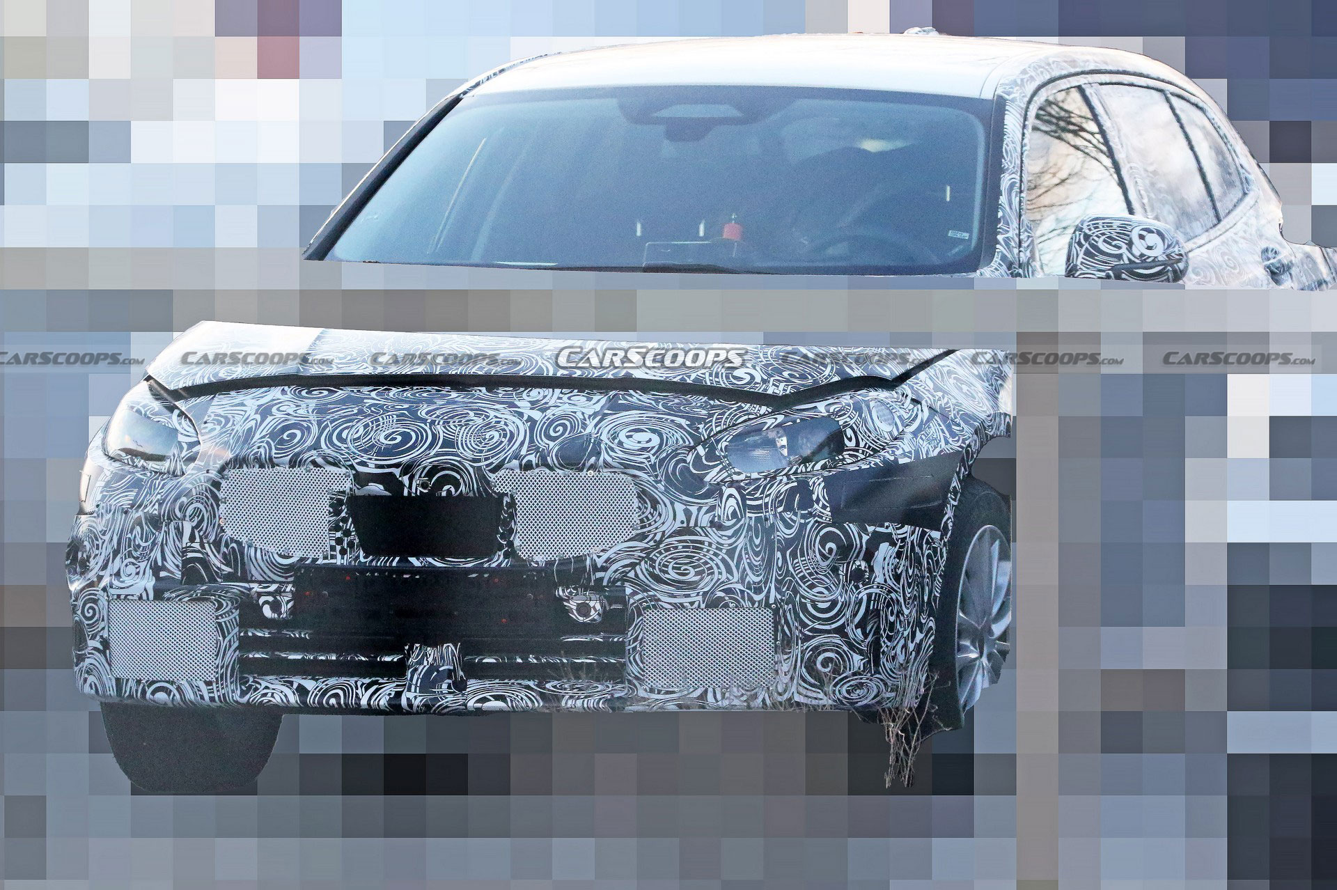 BMW Serie 1 2023: le prime foto spia del prototipo ripreso su strada